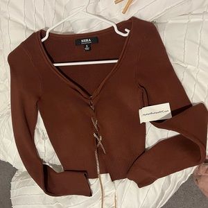 HERA gold cross cardigan